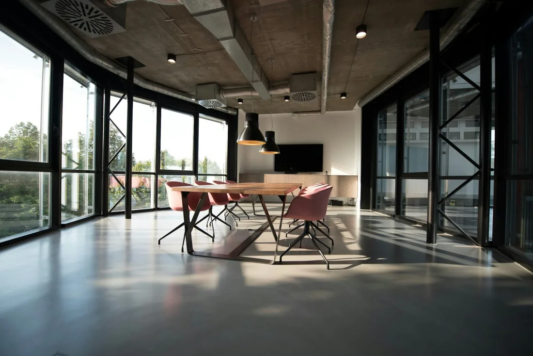 A sunlit contemporary workspace with natural materials